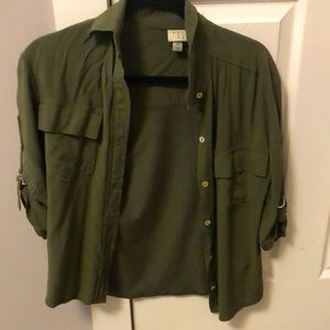 Simple forest green button down with rolled up sleeves.